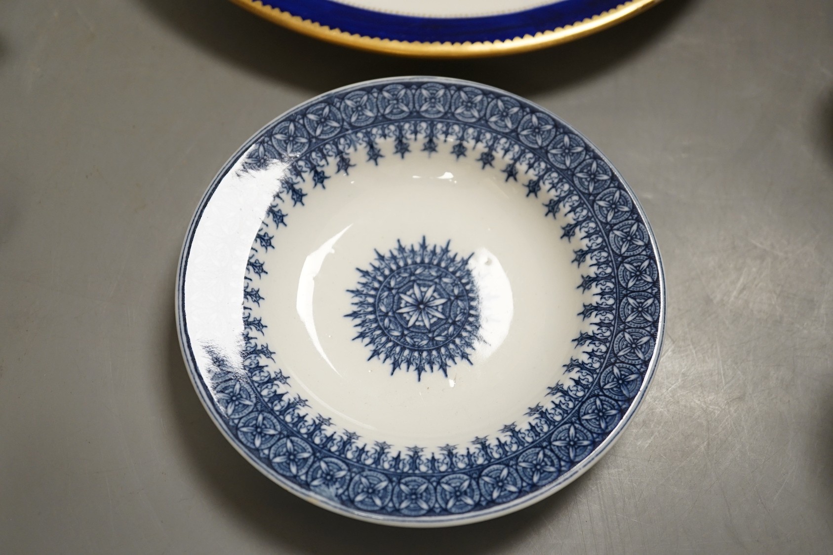 A 19th century enamel on copper trinket box, depicting a shipping fleet, together with a Chamberlain’s Worcester bird plate, a Royal Worcester coffee cup, a Meissen tea cup and three Chinese export cups (9)